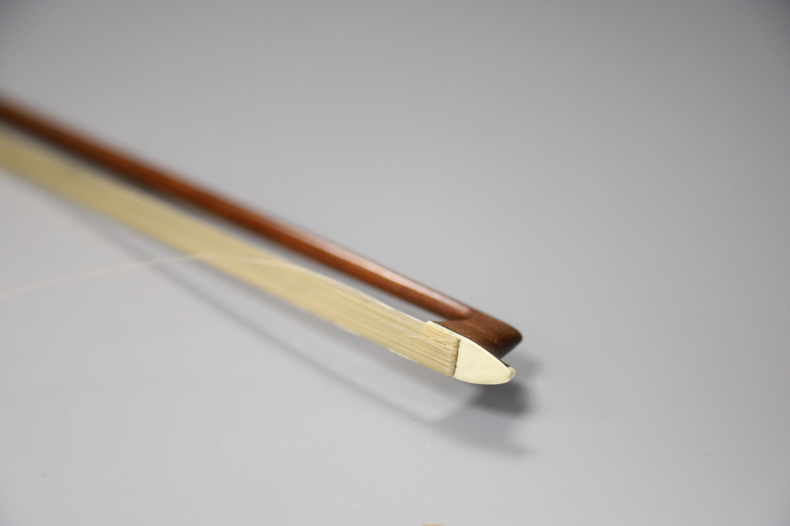 A 19th century German silver-mounted violin bow with original lapping